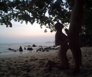 Russian young deep-throat on public beach after sunset