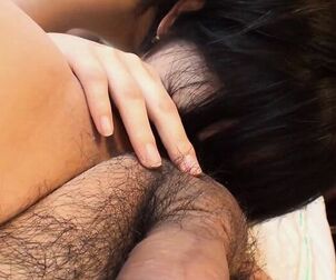 pretty chinese caresses my stiffy and takes it in her