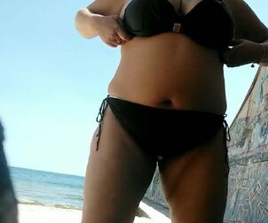 Stunning thick bum public. Relieving on beach