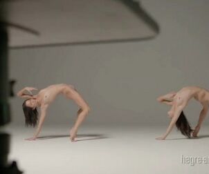 Incredible twin dolls showing naked gymnastic exercises